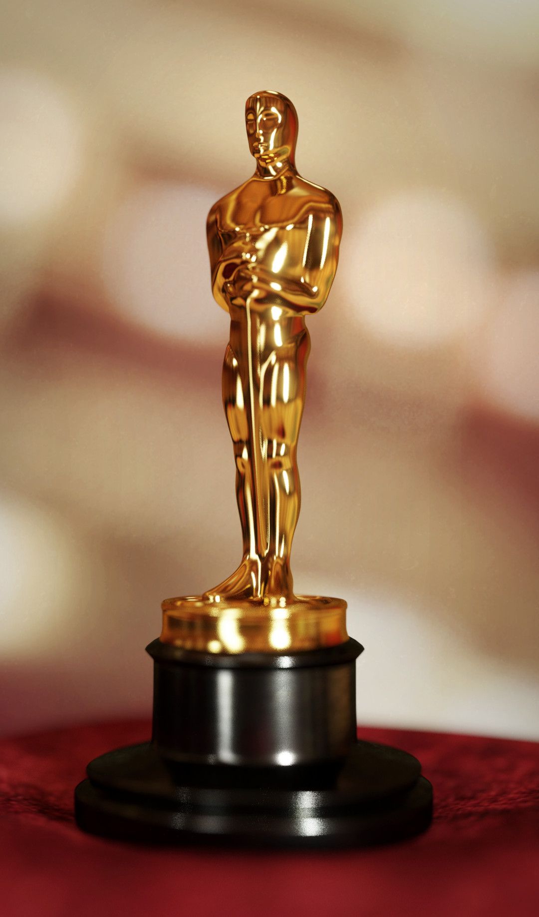 3D rendering of a close-up of an Oscar statue, placed on top of a red velvety pillow. The background is bright and golden.
